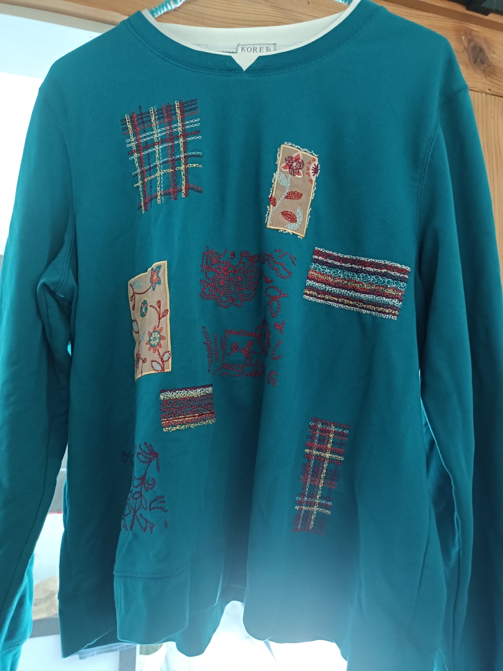Koret Teal Crewneck Sweater with Multicolor Embroidered Patches
